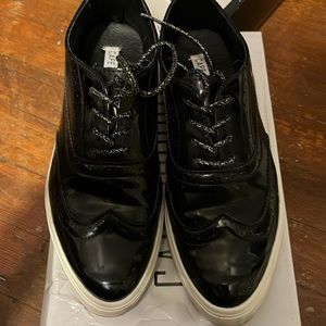 Black patent leather sneakers